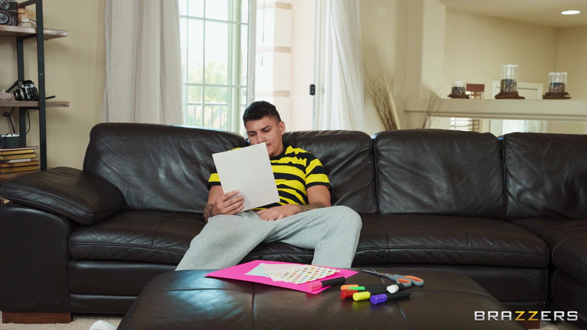 Jennifer White is the new smoking hot stepmother to Victor Ray. Victor’s dad wants him to get to know Jennifer while he’s out, but Victor can’t take his eyes off her amazing ass. He tries to cool off by chilling in the living room, but pretty soon Jennifer’s bent over, ass up, cleaning in his face. Victor’s got a major boner and decides to conceal it in Stepmother’s Day card his dad has put him in charge of making, and designs a sneaky gloryhole to stroke his cock through. Jennifer can tell he’s up to no good, so she crawls over to his lap to investigate. Jennifer opens the card to be surprised by a giant facial but she’s not mad, she wants more!