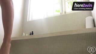 Nude adult gal in a shower masturbating