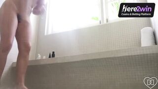 Nude adult gal in a shower masturbating